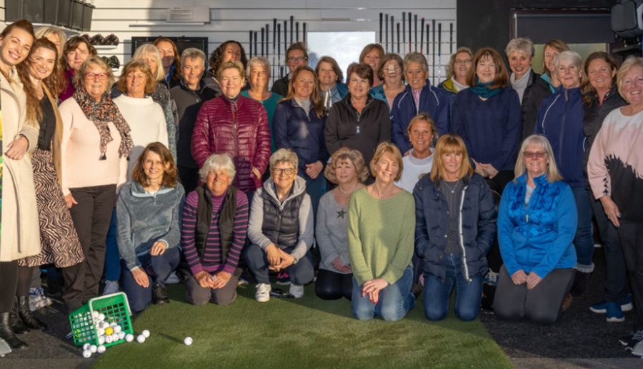 Representatives from Walkers, squad members and the golf professionals